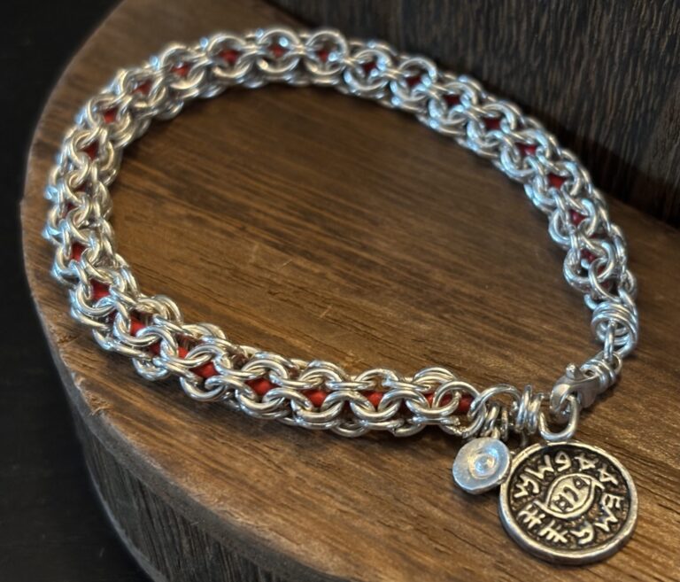 Handmade, soldered chainmail in sterling with leather cord